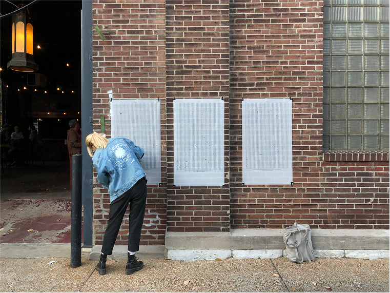 Setting up the posters.